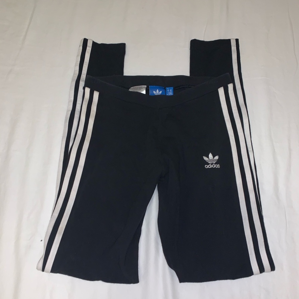 Black white striped Adidas leggings.